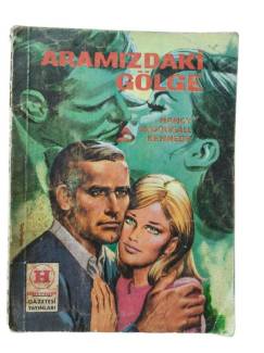 ARAMIZDAKİ GÖLGE