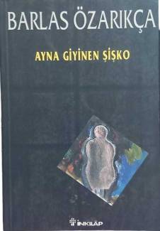 AYNA GİYİNEN ŞİŞKO