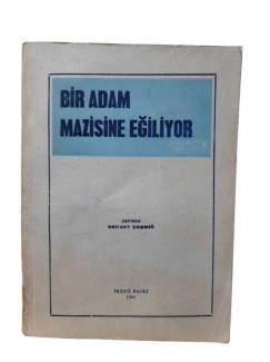 BİR ADAM MAZİSİNE EĞİLİYOR
