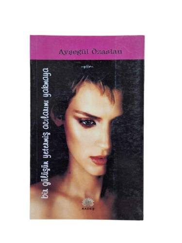 BİR GÜLÜŞÜN YETERMİŞ ACILARIMI YAKMAYA - 0
