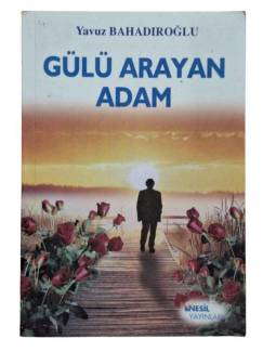 GÜLÜ ARAYAN ADAM