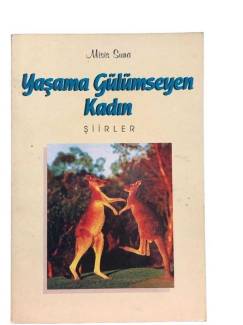 YAŞAMA GÜLÜMSEYEN KADIN